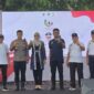 Foto : AHK Kadispora Kaltim Mendampingi Sri Wahyuni Sekda Prov. Kaltim Saat Foto Bersama Forkominda Yang Hadir